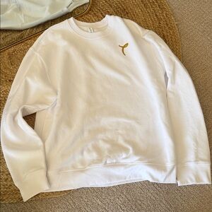 Sweater with Embroidered “T” in Disney font